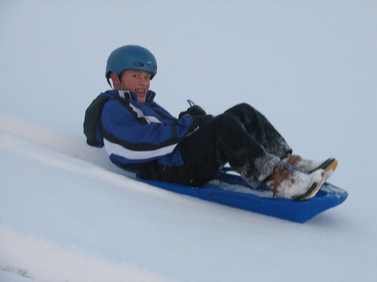Ice Sled - Ice Meister Slicer - All-Season Sled rides on blocks of ice on grass