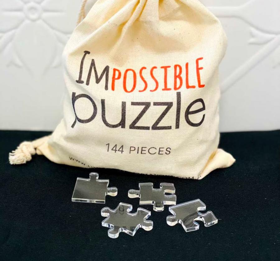 This Tiny Impossible Puzzle Uses Transparent Jigsaw Pieces To Make It Extra  Hard