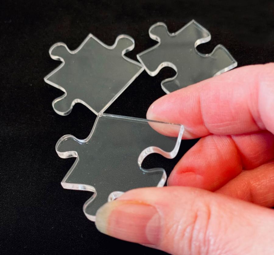 This Tiny Impossible Puzzle Uses Transparent Jigsaw Pieces To Make It Extra  Hard