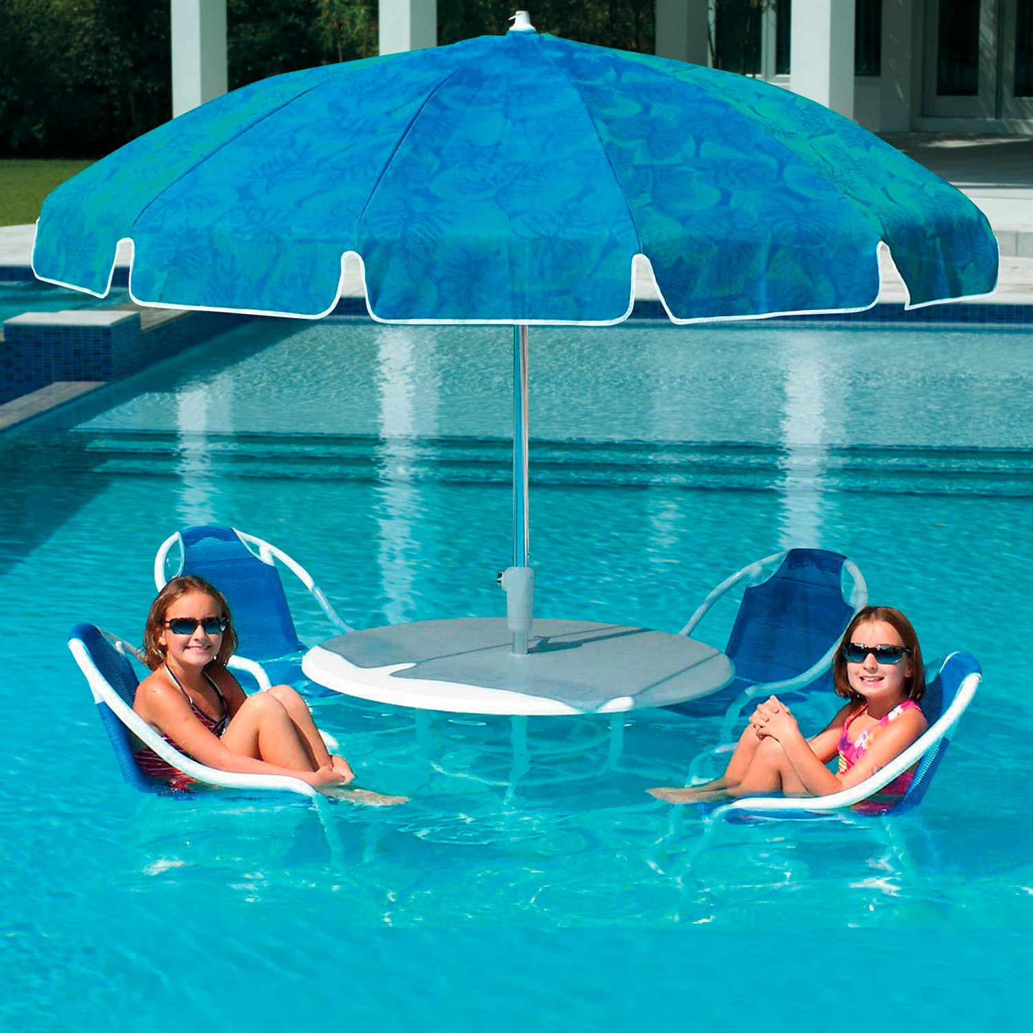 table and chairs in pool