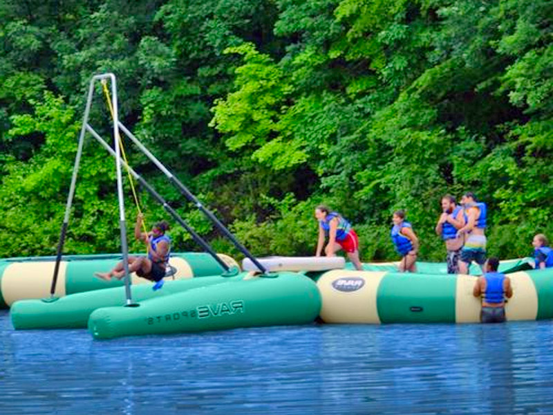 This Inflatable Floating Rope Swing Is a Must For Lake Property Owners