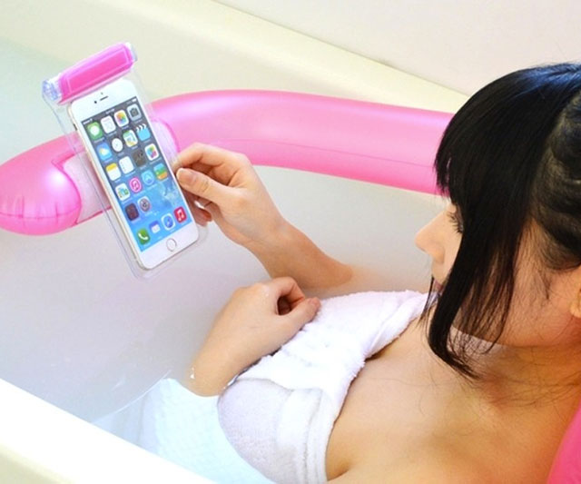 Inflatable Pillow That Holds Your Smart Phone In Bath Tub