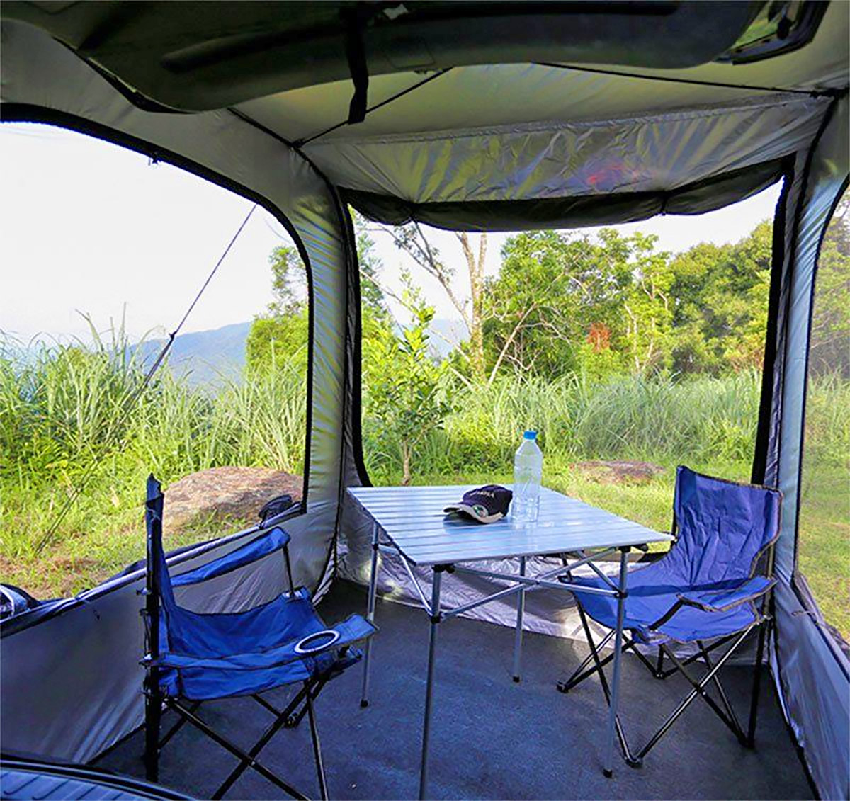 This Instant Pop Up Car Tent Attaches To The Tailgate Of Your SUV