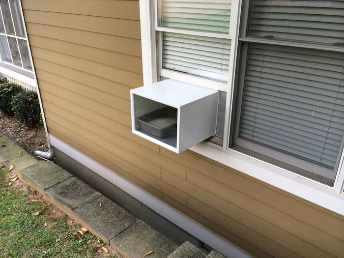 Window litter outlet box