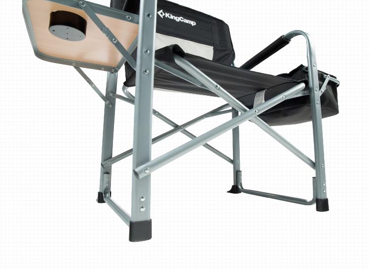 Folding lawn chair with table outlet attached