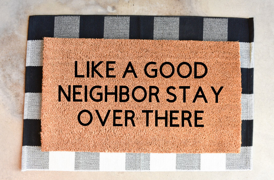 https://odditymall.com/includes/content/upload/like-a-good-neighbor-stay-over-there-doormat-9291.jpg