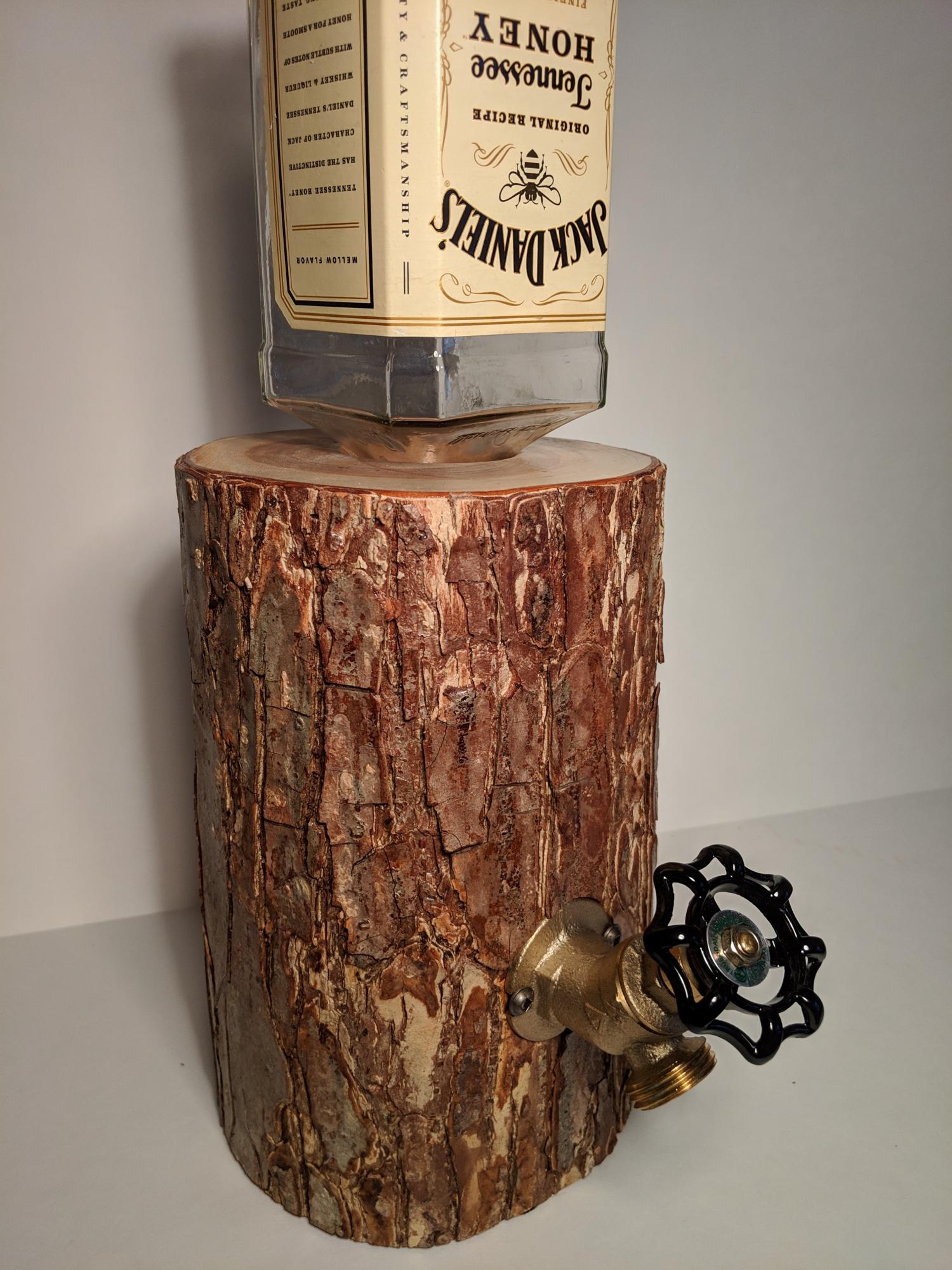 Liquor Log Dispenses Your Booze Through An Actual LogLiquor Log Booze Dispenser