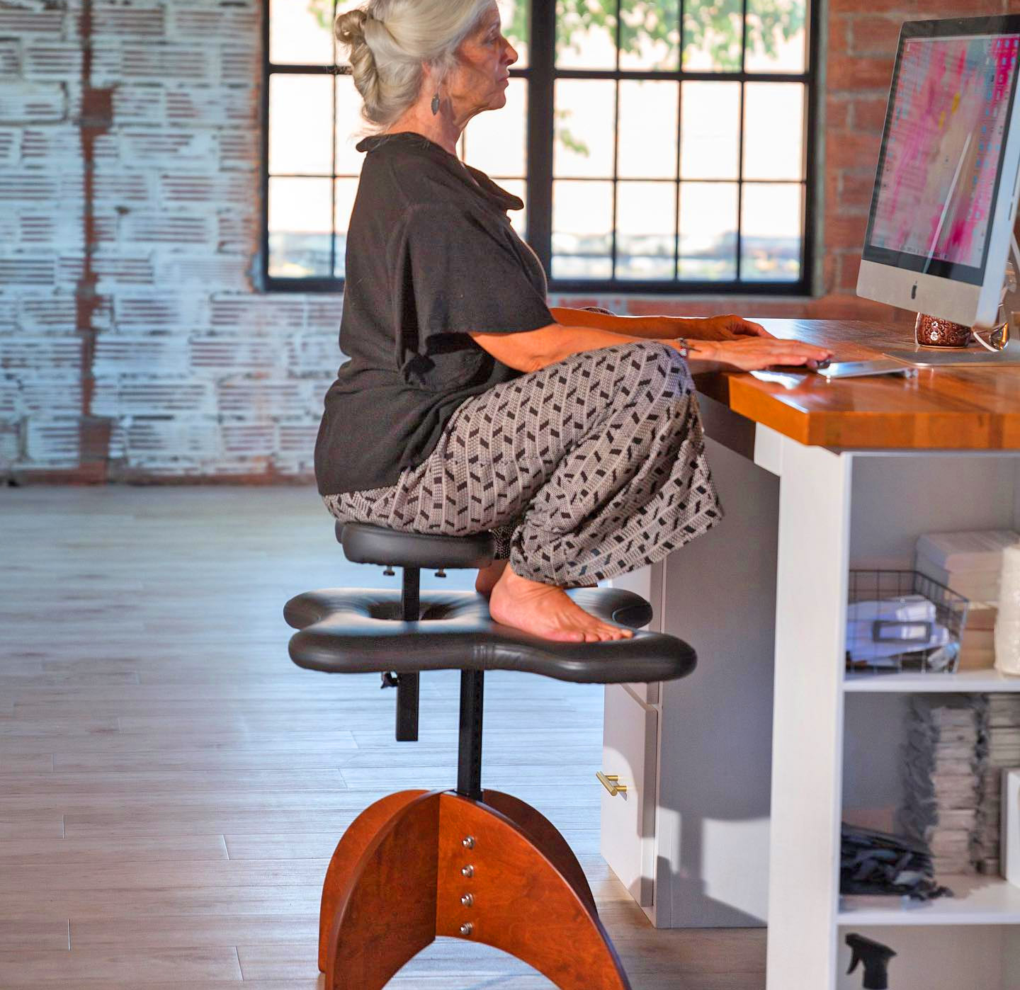 You Can Get an Office Chair That Lets You Sit Cross-Legged at Your Desk