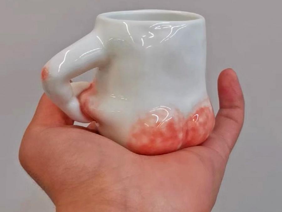 https://odditymall.com/includes/content/upload/pinching-fat-belly-coffee-mug-3105.jpg