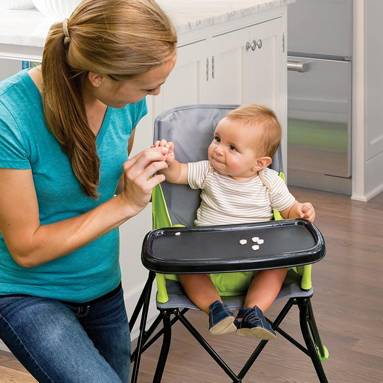 Portable Highchair Folds Up For Feeding The Baby On The Go