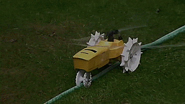 Raintrain Traveling Sprinkler - Robotic sprinkler crawls across lawn
