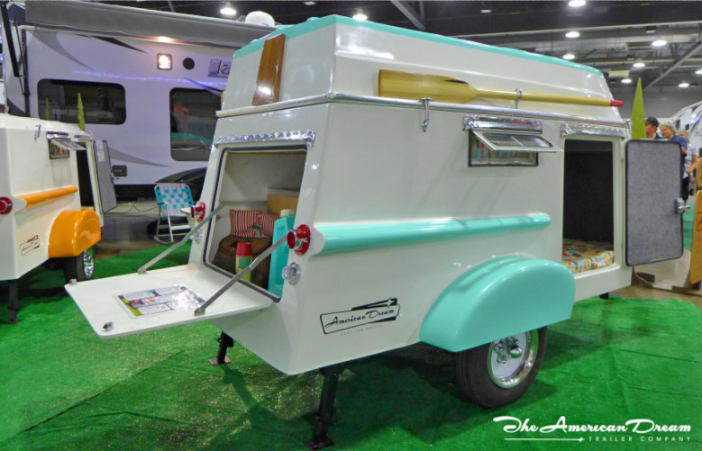 Retro Camper Boat - 1950's Teardrop trailer with row boat as roof of camper