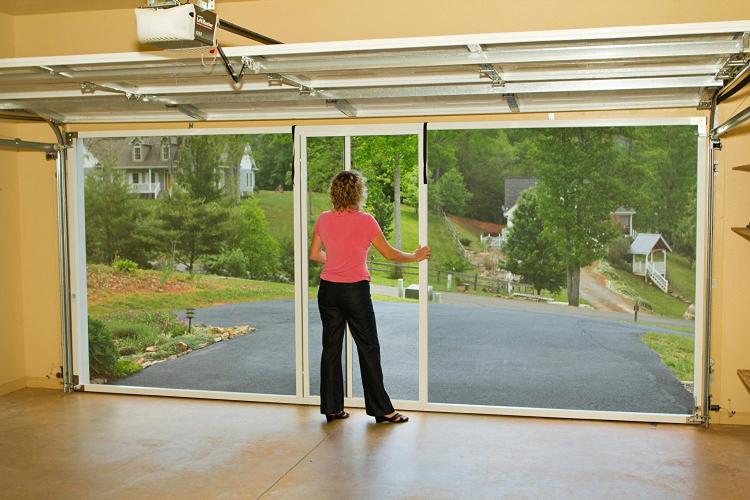 This Rolling Mosquito Screen Attaches To Your Garage Door Track