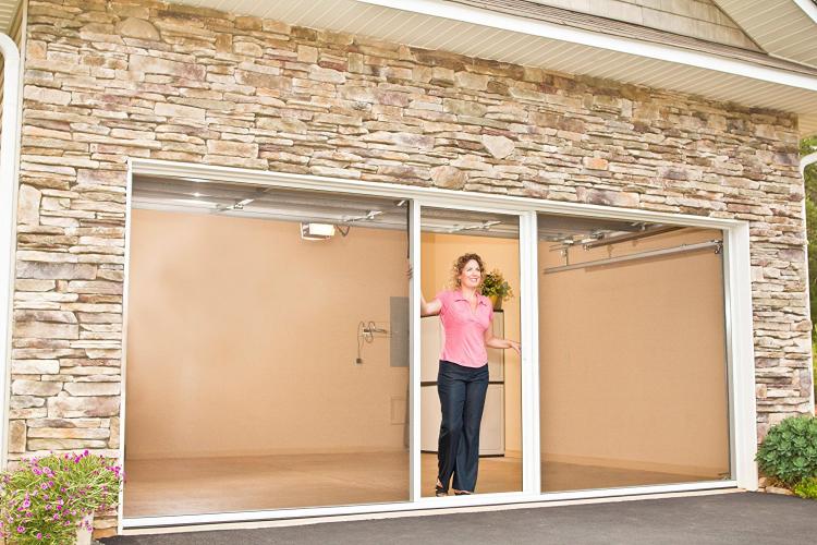 This Genius Rolling Mosquito Screen Attaches Right To Your Garage Door Track