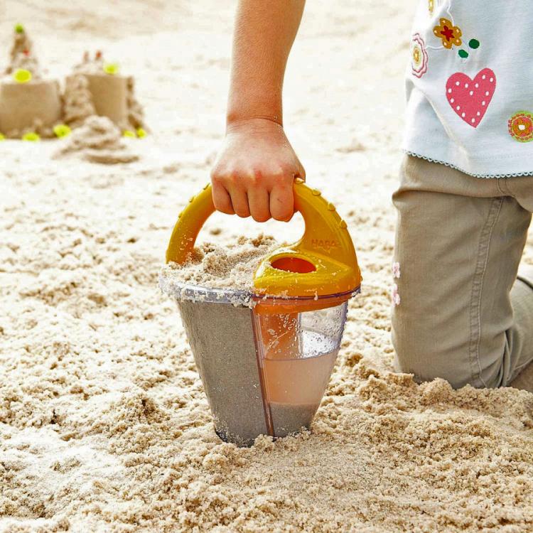 Sand Funnel Mixes Water and Sand