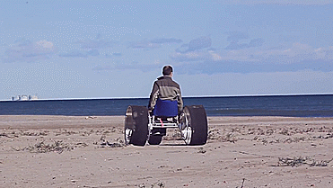 SandRoller - Giant Wheeled Beach Sand Wheelchair - GIF