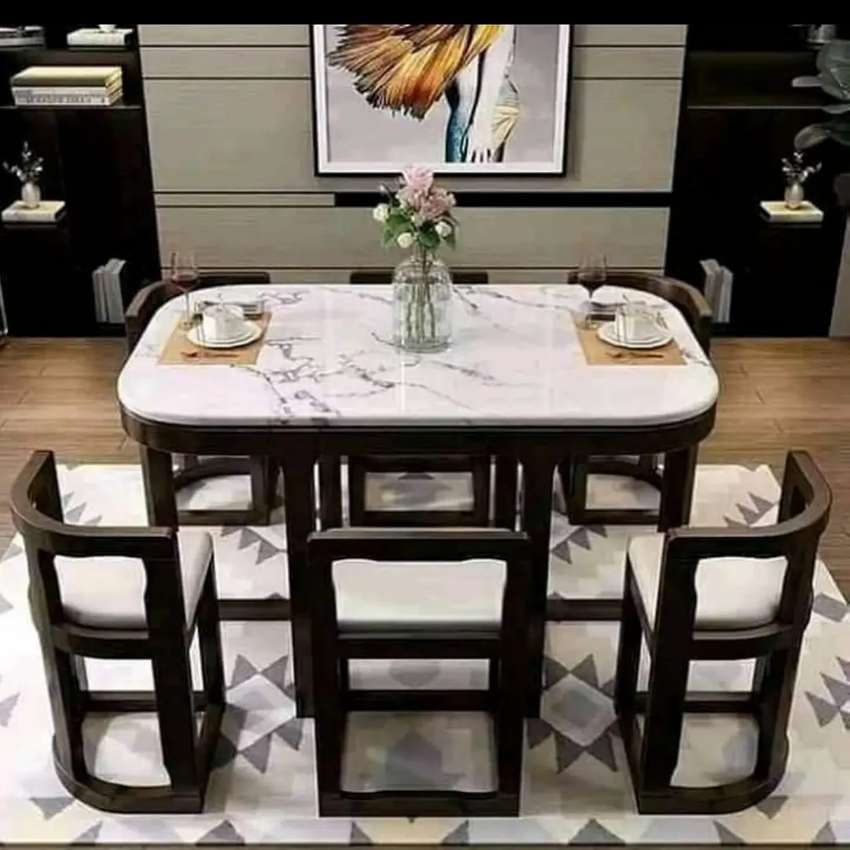 Space Saving Tuck Under Dining Tables, Round Kitchen Table With Chairs That Fit Underneath