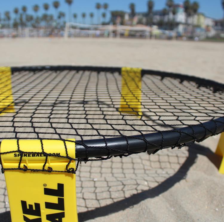 Spikeball: Energetic game combining volleyball and four square.