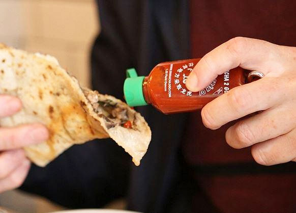 Sriracha2Go, A Tiny Refillable Bottle of Sriracha That Clips to a Keychain