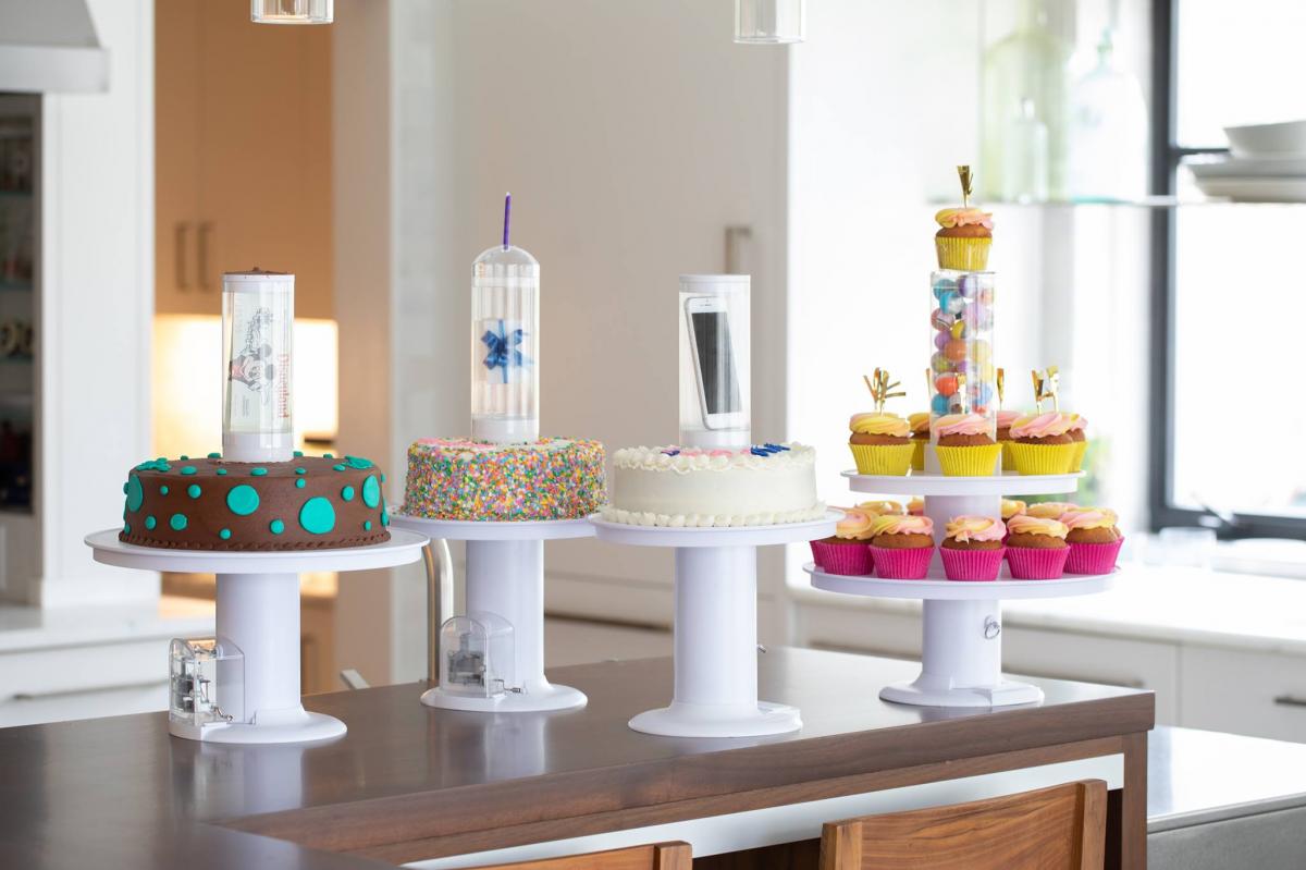 This Surprise Cake Stand Pops a Secret Gift Out Of The Center Of The Cake