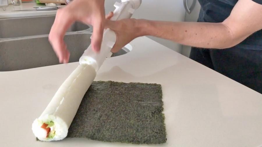 This Sushi Bazooka Gun Makes a Giant Log Of Sushi Rolls