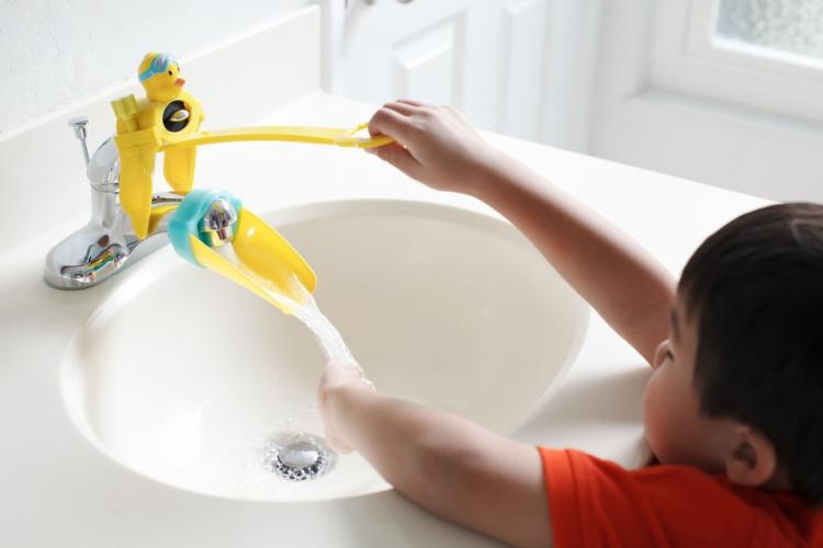 The Aqueduck Faucet Handle Extender Helps Kids Reach The Faucet