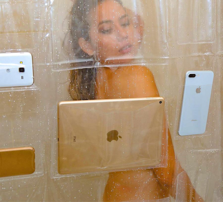 shower curtain that will hold tablets and or smart phones so you can play games, watch videos, and more while you shower
