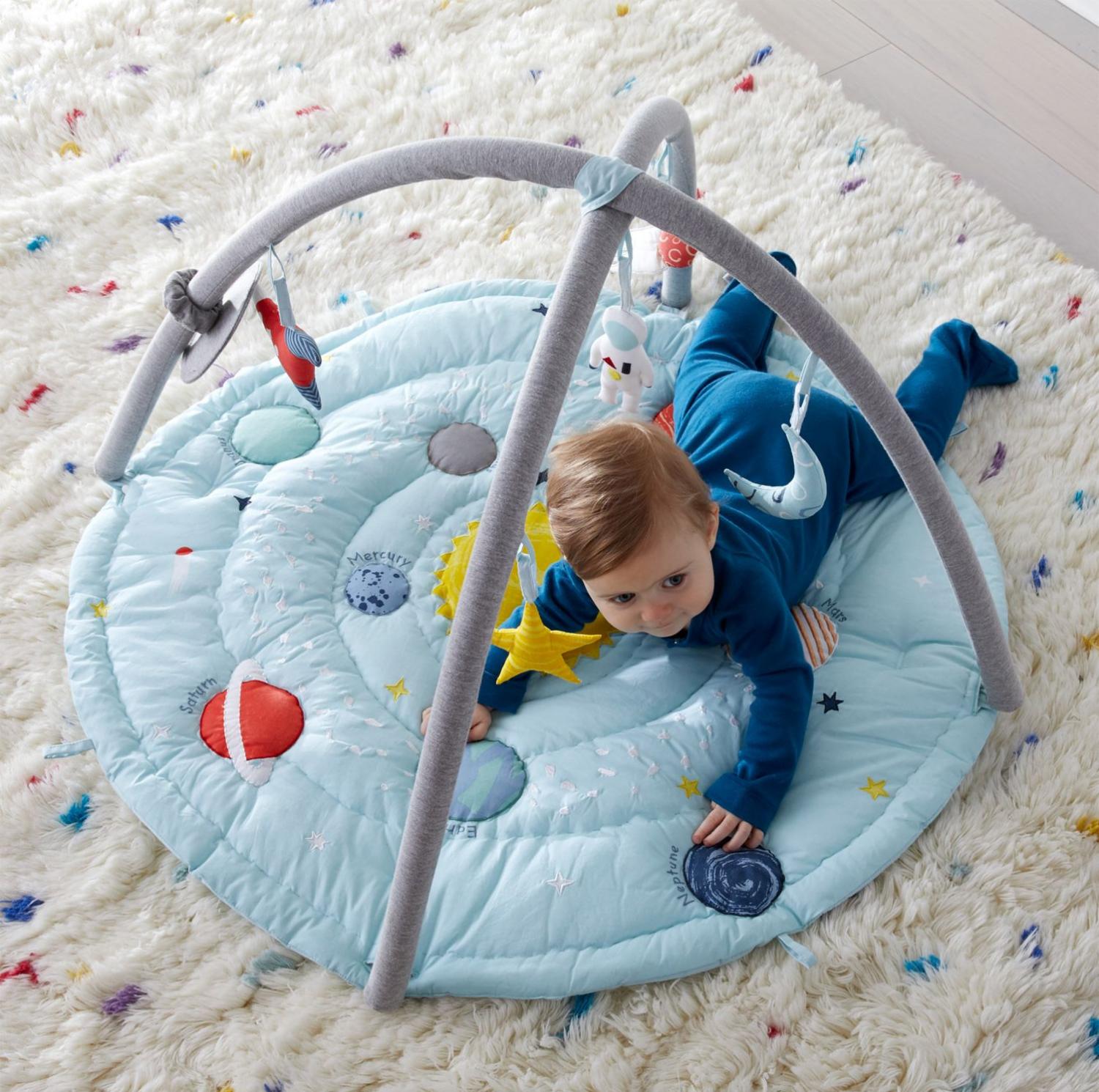 This Cute Baby Activity Chair Helps Them Learn About Space And The