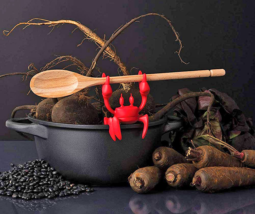 https://odditymall.com/includes/content/upload/this-crab-cooking-helper-will-release-steam-and-hold-your-spoon-9330.jpg