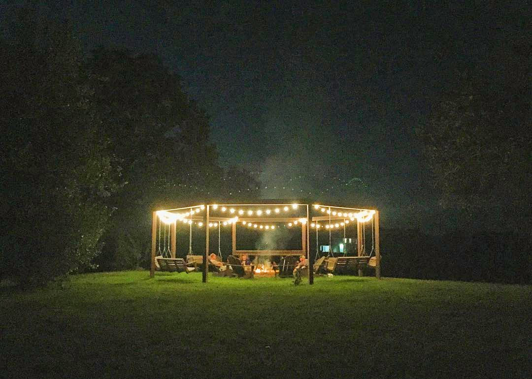 This Diy Backyard Pergola With Swings Is The Perfect Piece To Surround Your Fire Pit