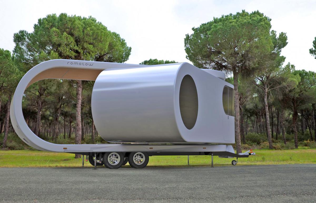 Futuristic Camping Trailer Rotates Around To Reveal Huge Party Deck - Romotow swiveling luxury camper