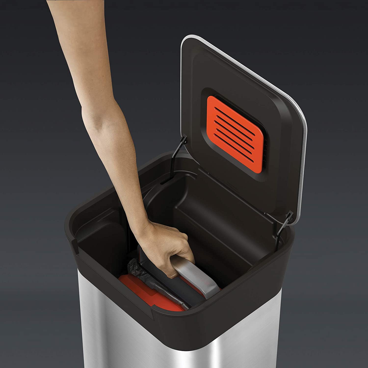 https://odditymall.com/includes/content/upload/this-garbage-can-has-a-built-in-manual-trash-compactor-1198.jpg