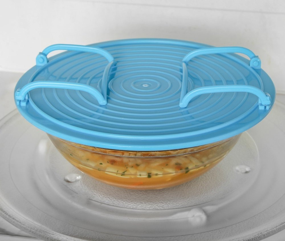 This Genius Bowl Holder Lets You Safely Remove Scalding Hot Bowls From The  Microwave