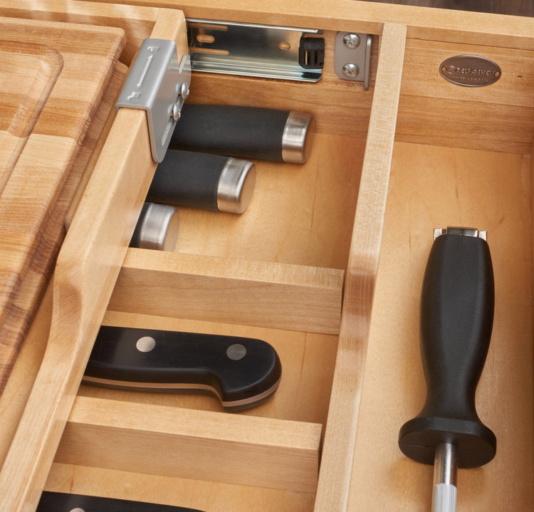 This Genius Knife Drawer Locks Your Knives and Stores Cutting Boards