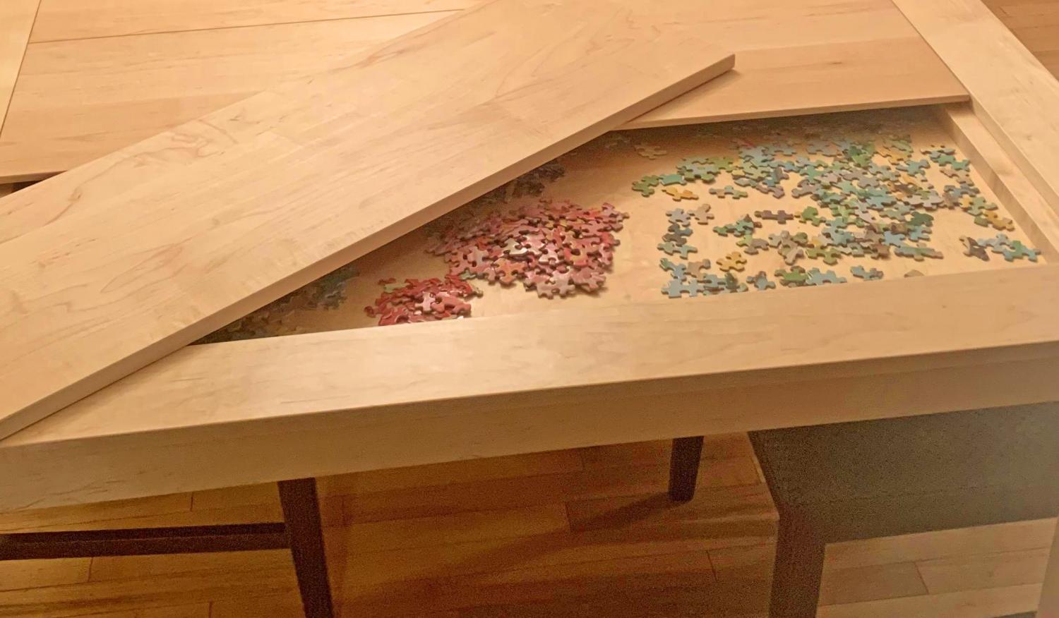 Table with hidden store puzzle compartment