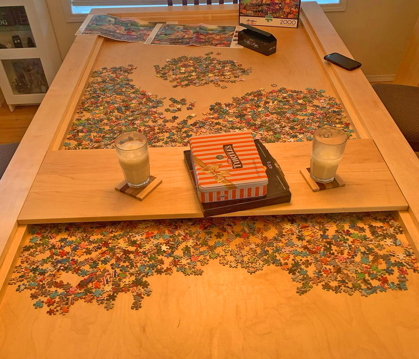 This Amazing Dining Table Has a Hidden Game/Puzzle Compartment Under