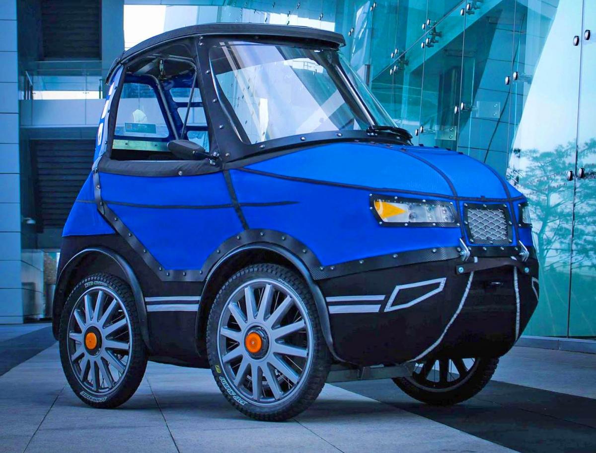 This Incredible Bicycle Car Is an E-Bike That Keeps You Warm During ...