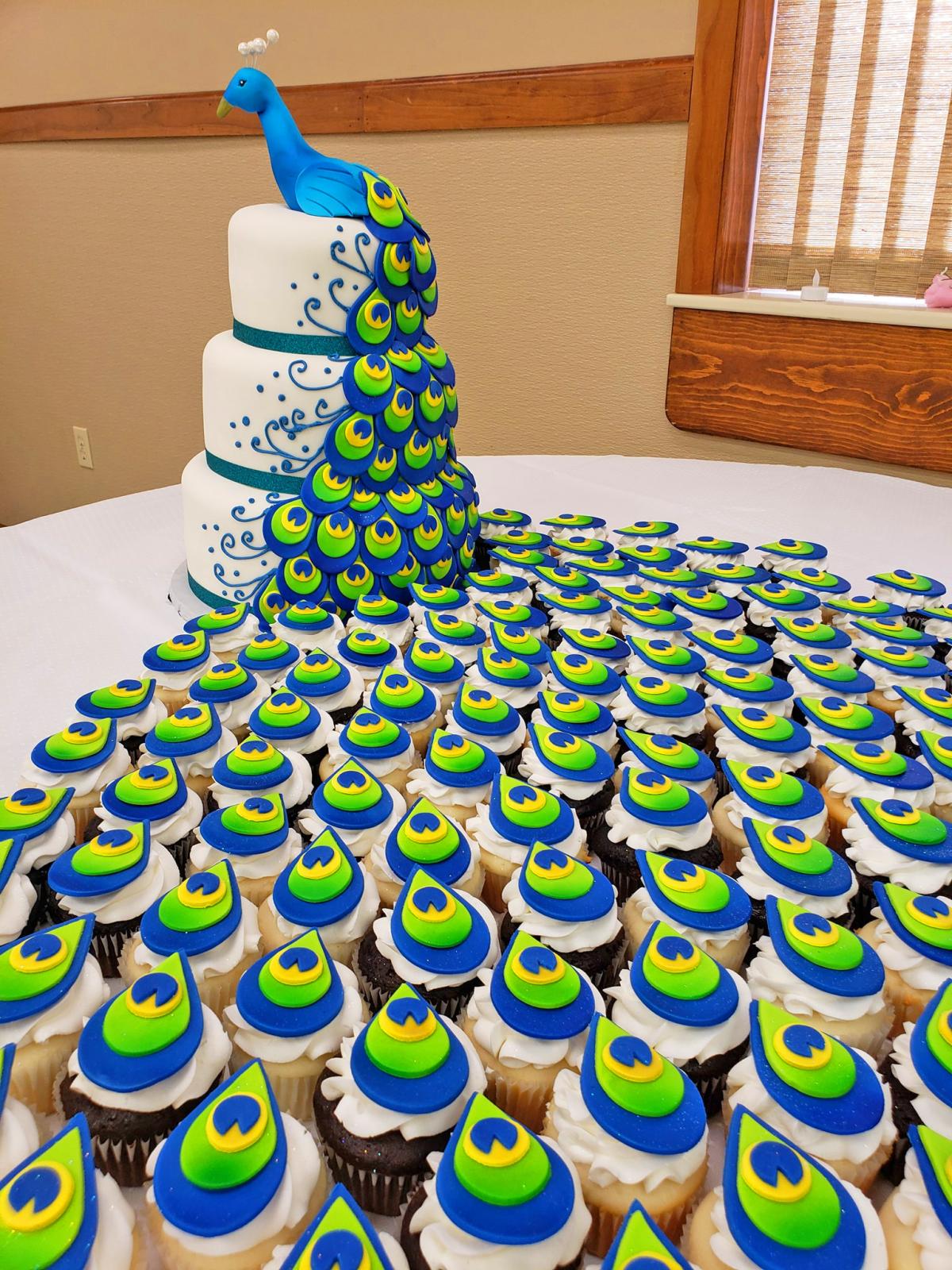 This Incredible Peacock Wedding Cake Uses Cupcakes For The Tail