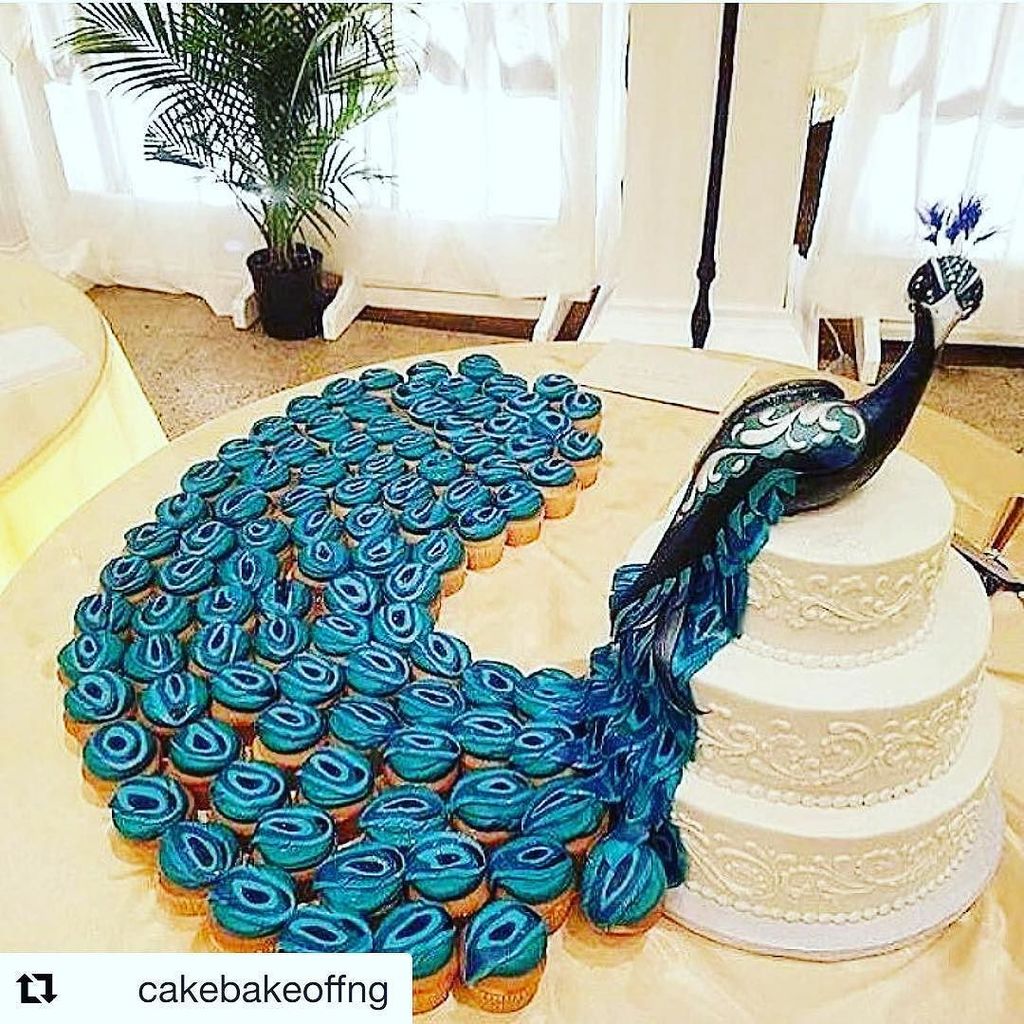Peacock Wedding Cake - Creative three-layer peacock cake uses cupcakes for the tail of the bird