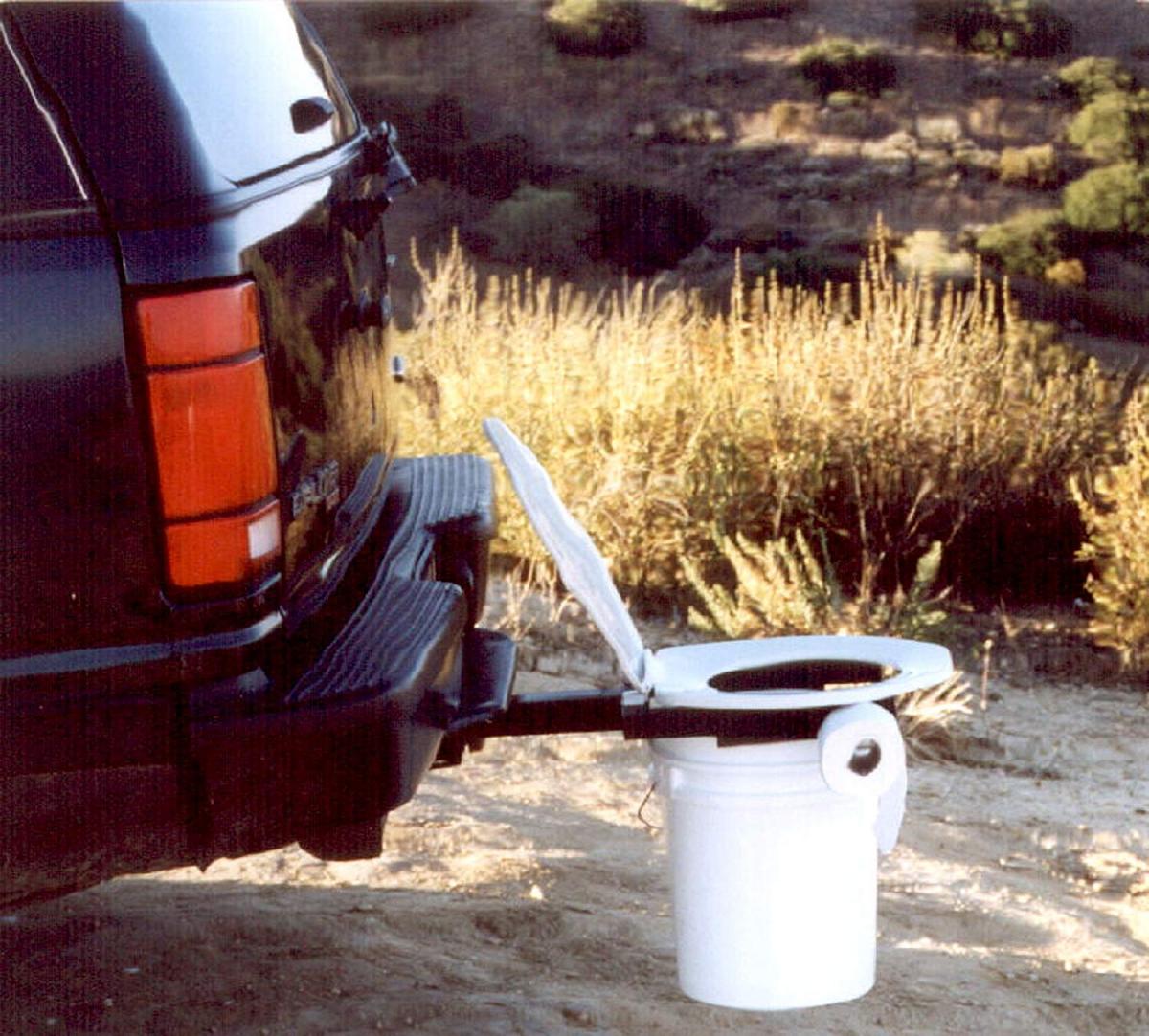 Bumper Dumper - Portable Toilet Seat attaches to truck hitch