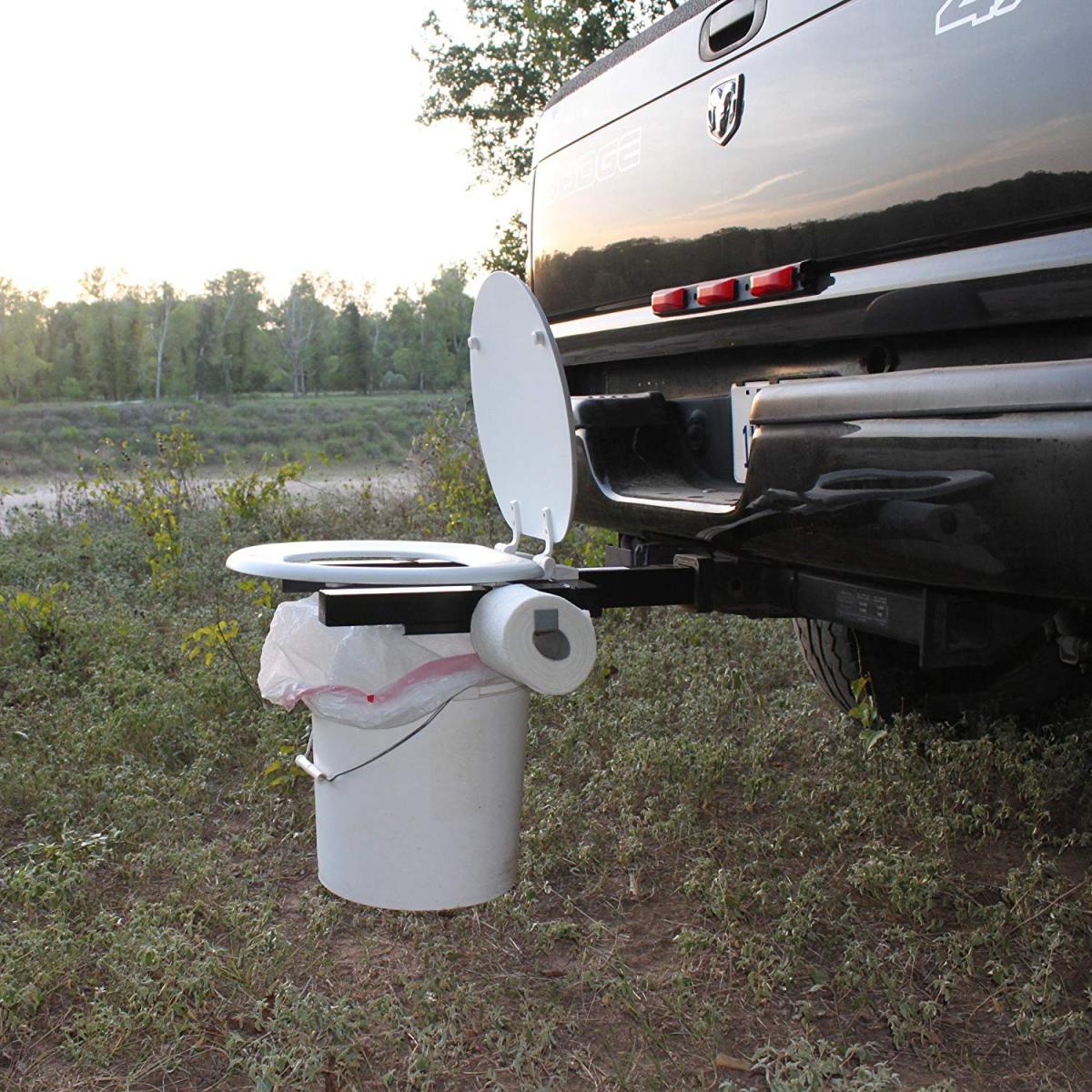 Bumper Dumper - Portable Toilet Seat attaches to truck hitch.