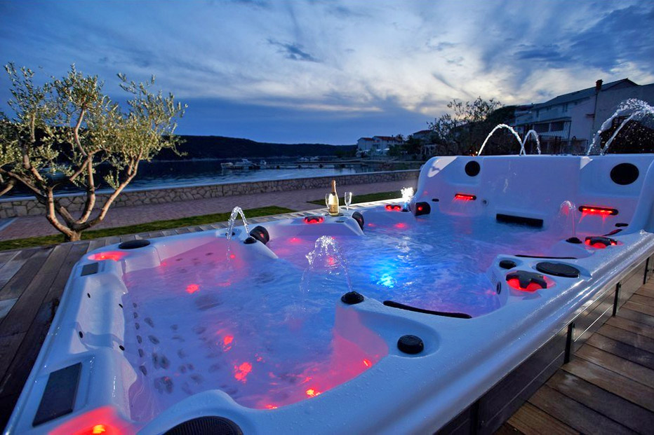 This Ultimate Hot Tub Has Two Tiers With An Attached Endless Swimming Pool