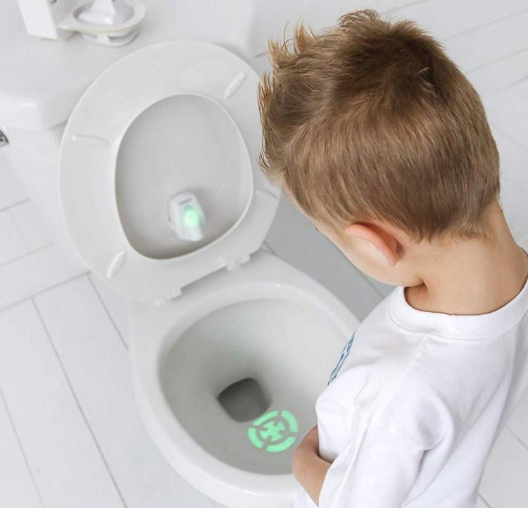 Toddler Target Toilet Light Helps Potty Train - Projected target shape potty trainer