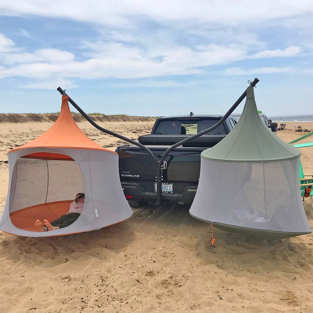 This Trailer Hitch Hammock Stand Lets You Set Up Dual Lounge