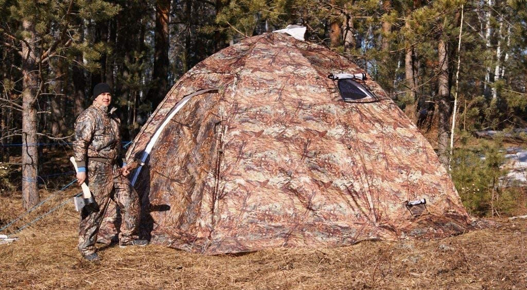 This Ultimate Cold-Weather Camping Tent Has a Built-in Wood Stove