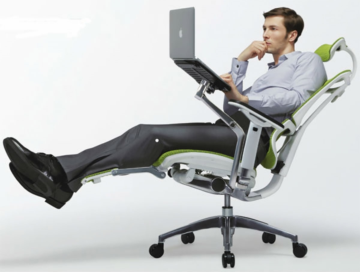 This Ultimate Office Chair Has a Laptop Mount, Leg Rests, and a Head Rest