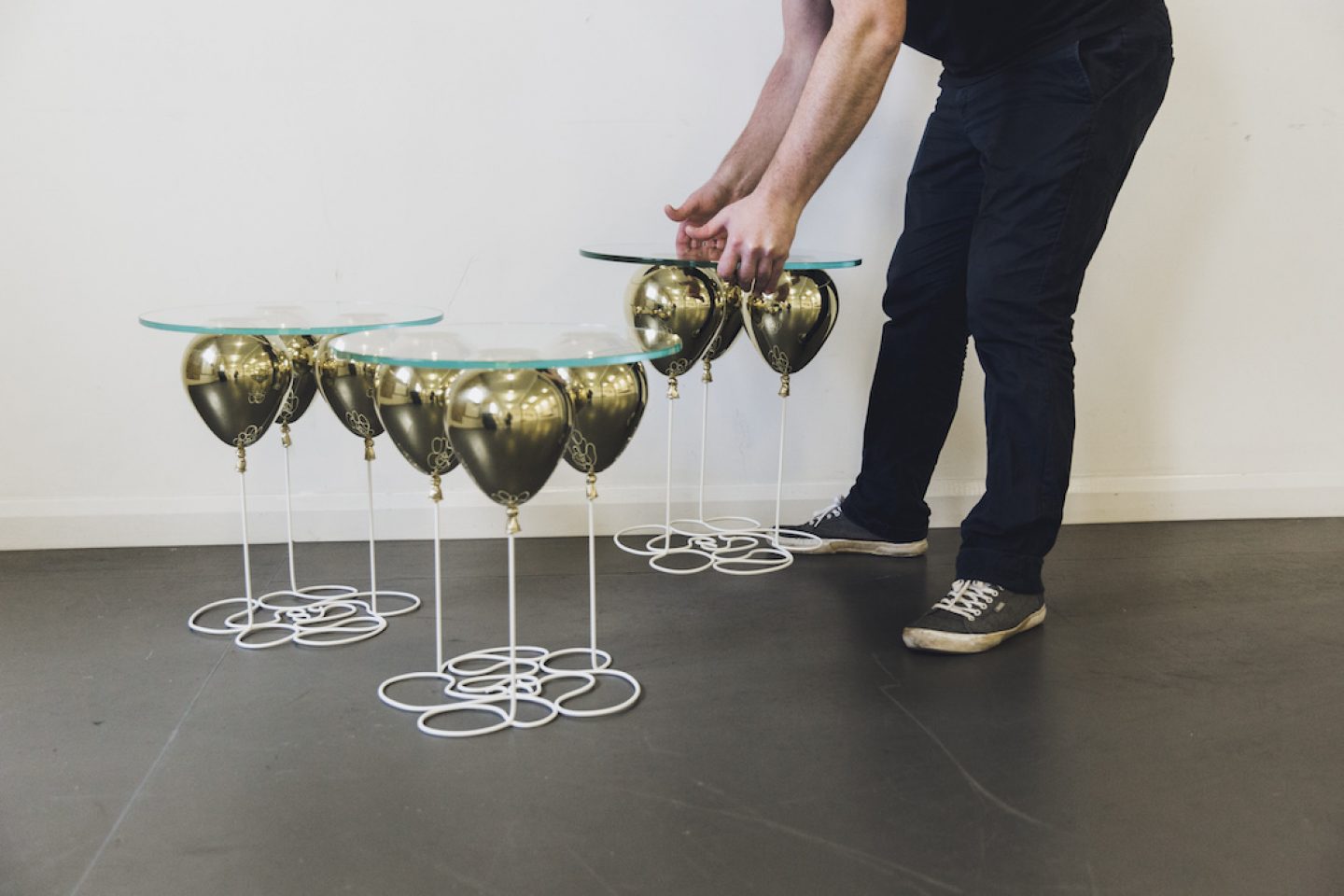 Up Balloon Table - Artsy table using balloons to hold up glass tabletop - Duffy London
