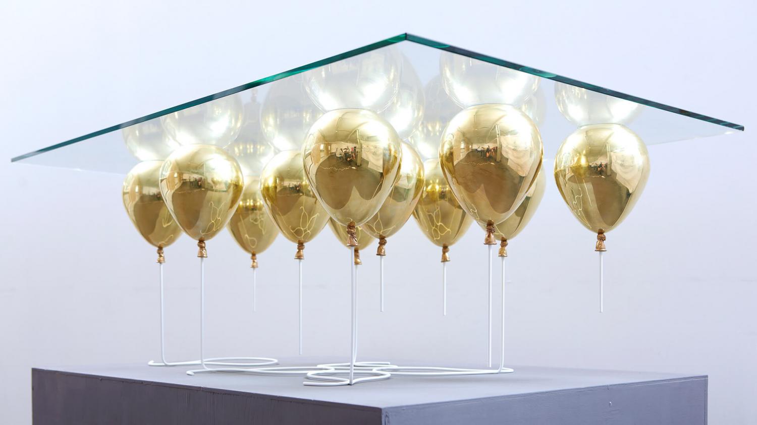 Up Balloon Table - Artsy table using balloons to hold up glass tabletop - Duffy London