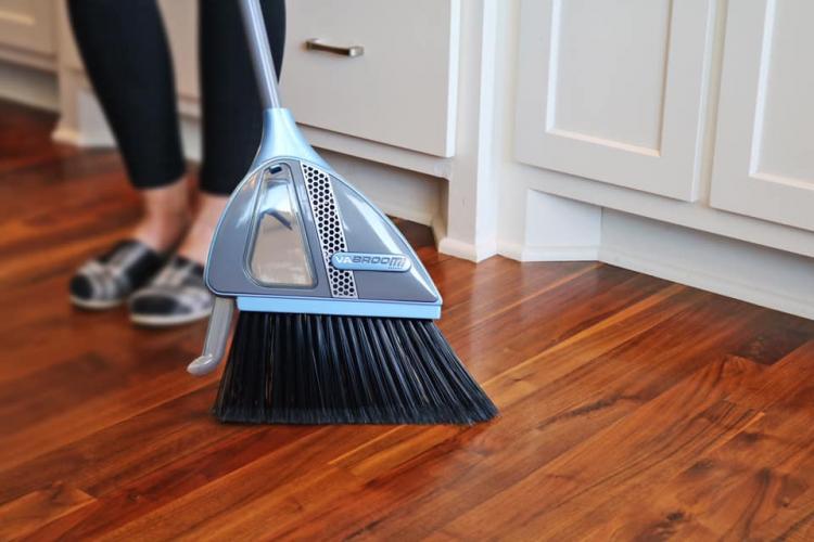 vacuum and broom storage