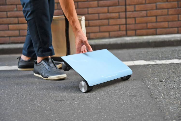 Walk Car: Flat Hoverboard Electric Scooter Looks Like a Laptop - Flat scooter fits into purse